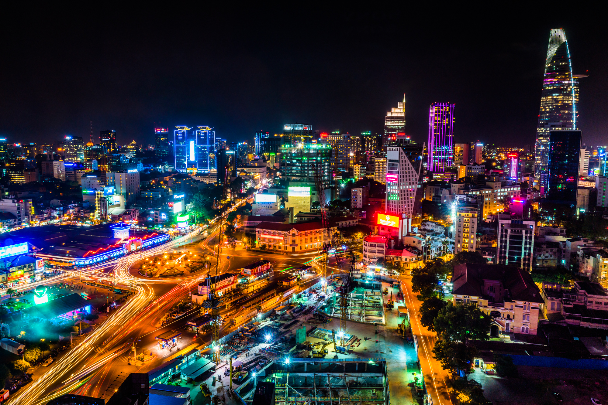 A nighttime view of a bustling Ho Chi Minh City, Vietnam