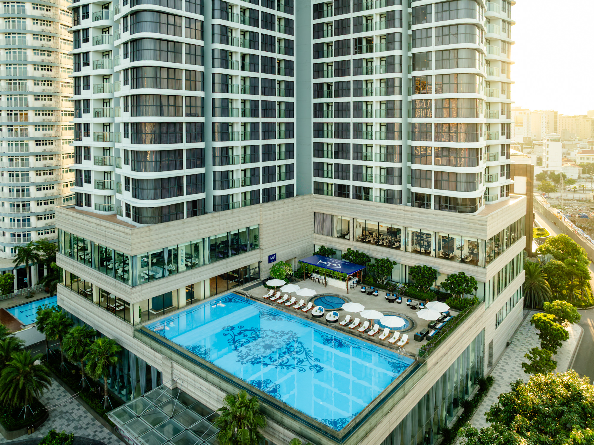 A rooftop infinity pool overlooking sweeping views of Danang, Vietnam.
