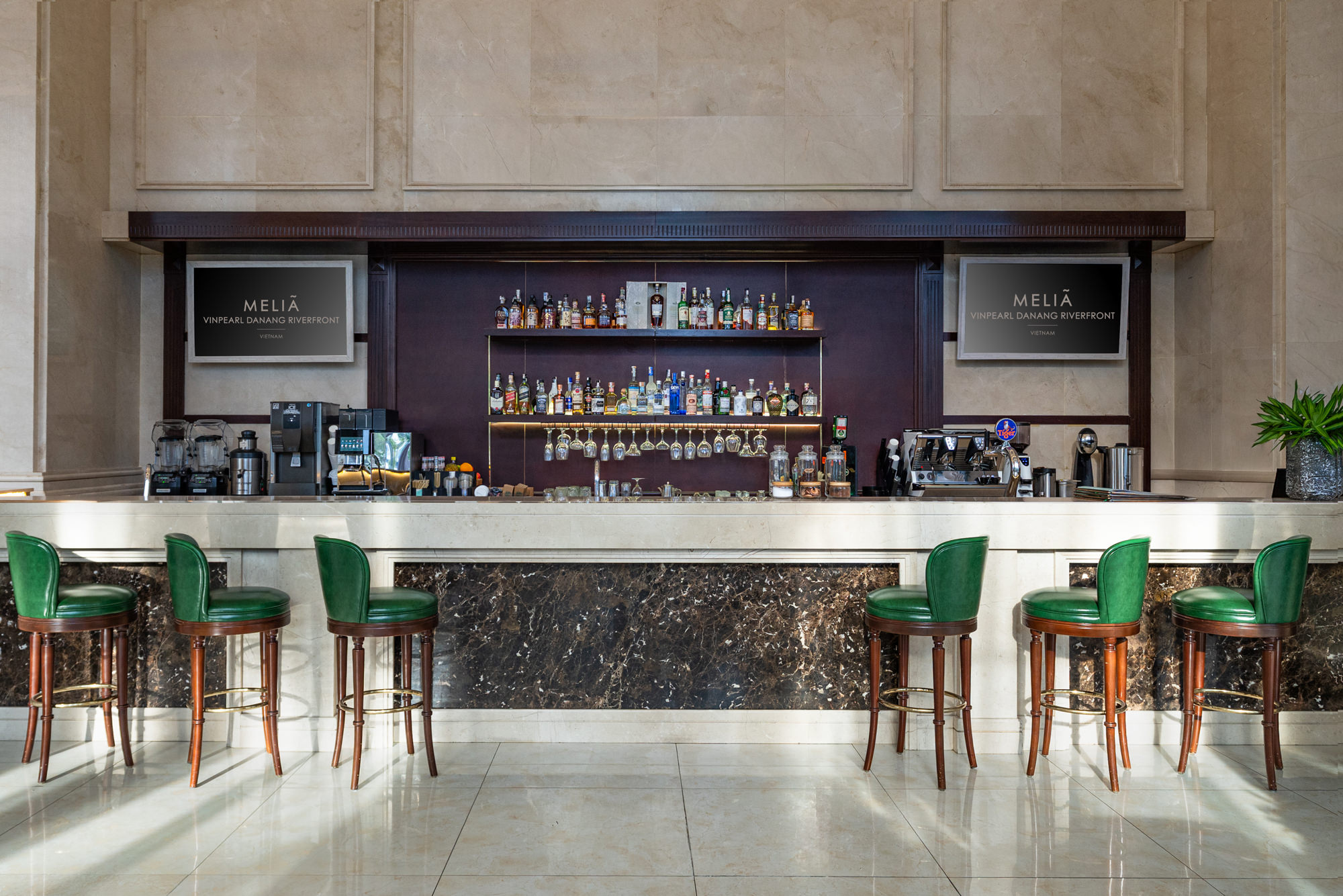 A refined lobby bar welcomes guests at a five star hotel in Danang, Vietnam.