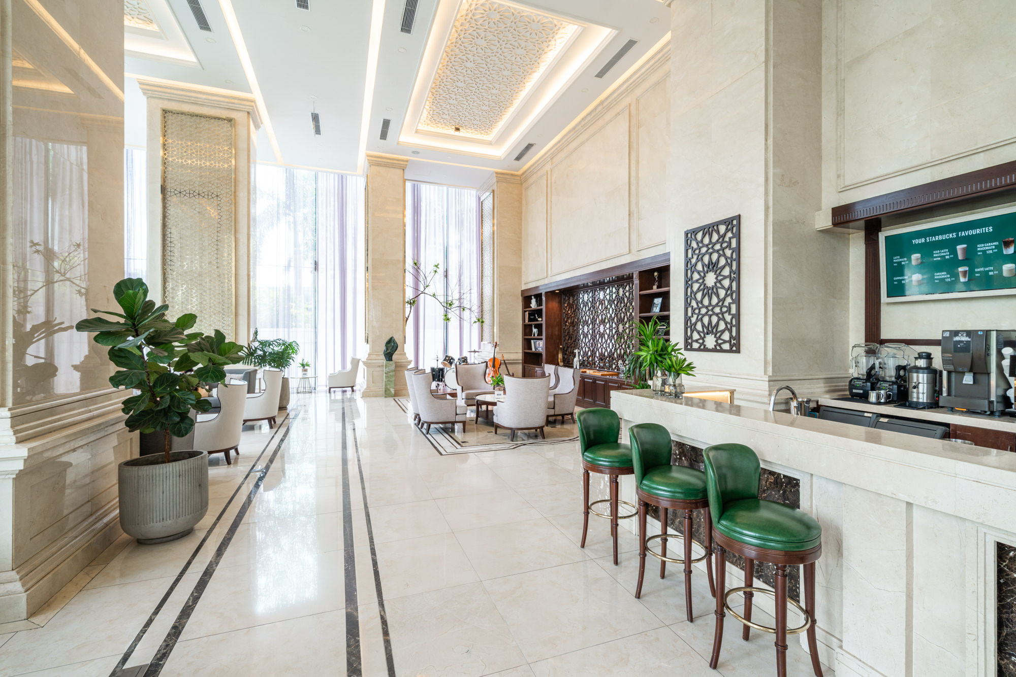 A refined lobby bar welcomes guests at a five star hotel in Danang, Vietnam.
